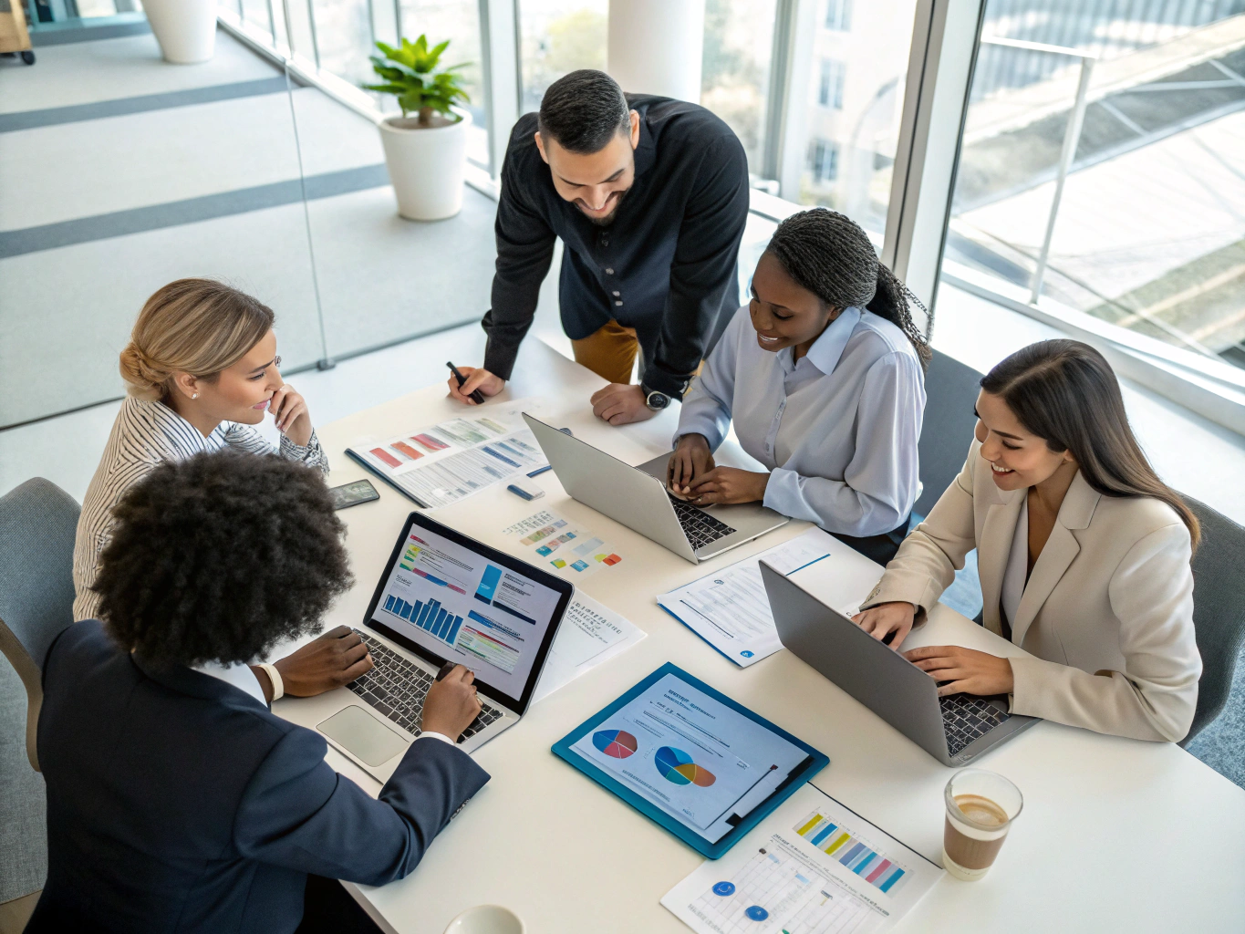 High-performing boutique consulting team collaborating at meeting table